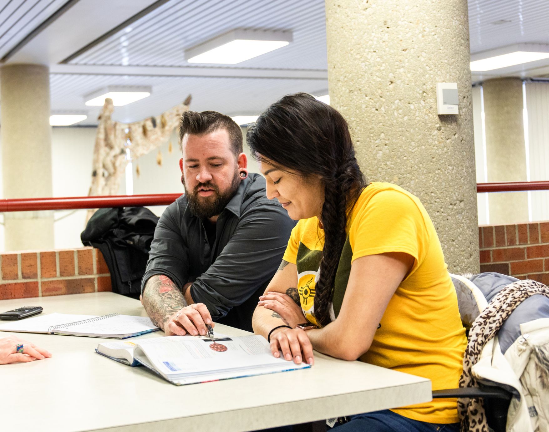 Patron being helped in Ablah Library